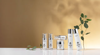 Hrda Skin various products with eucalyptus leaves on gold background